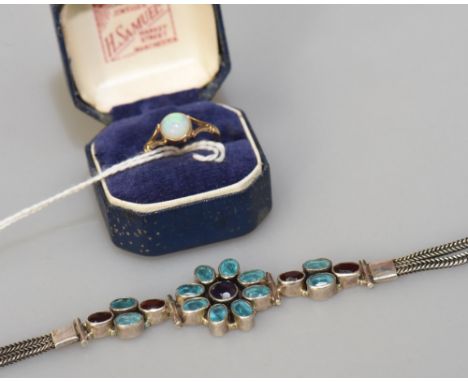 An single opal ring together with a coloured glass flower bracelet on white metal strap (2)