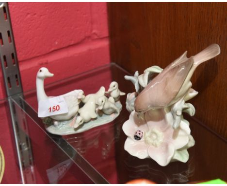 Two Lladro porcelain figures of a duck with ducklings and a bird on a branch with a ladybird (2)