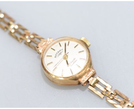 A Rotary 7 jewel 9ct gold ladies wristwatch with circular face with baton numerals, on link strap, 