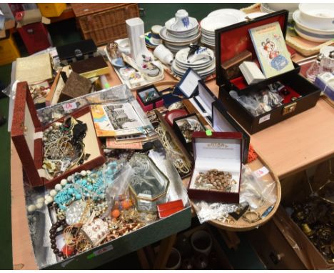 Three trays containing a quantity of costume jewellery, Oriental fans, playing cards, lady's evening purse, postcards etc; to