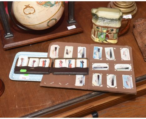 A collection of Mobil Oil Company Vintage Car series cards in a fitted case, together with a Cigarette Album with various inc