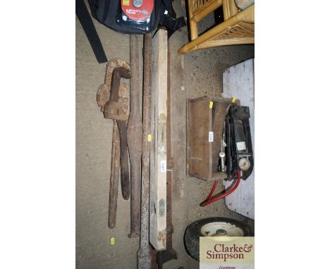 A sash clamp; two pairs of stilson's; two vintage wooden levels etc.