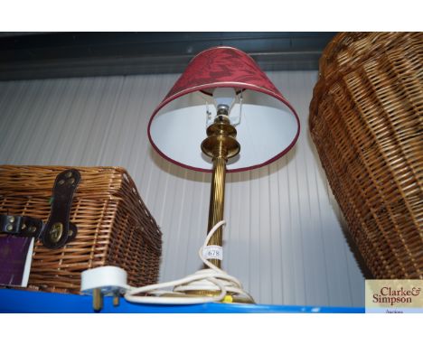 A brass table lamp