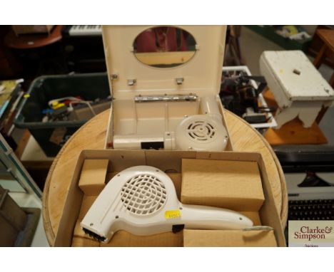 A Morphy Richards noiseless hairdryer (sold as collectors item), together with another Ormond Hairdryer (sold as collectors i