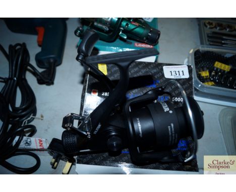 A Silstar Bait Runner fishing reel