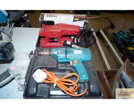 A Power Devil sander and a Black &amp; Decker electric drill 