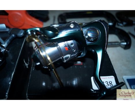 An Abu Garcia Cardinal reel with box 