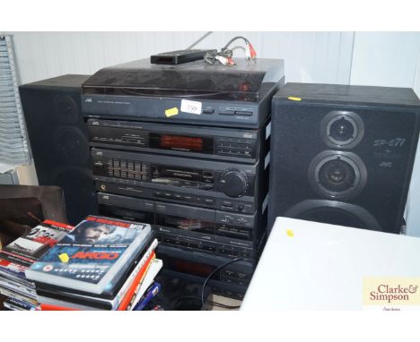 A JVC stack to include a turntable, a stereo double cassette deck, a computer controlled remote operating system, compact dis