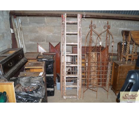 A wooden extending ladder