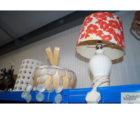 A table lamp together with a wooden salad bowl with lampshades etc.