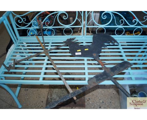 A weather vane in the form of a cockerel