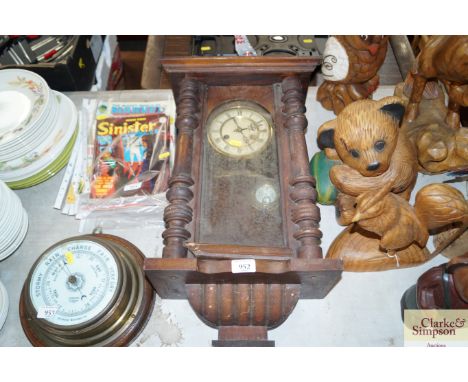 A two hole wall clock