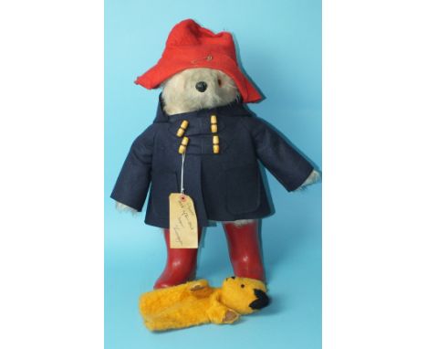 A Paddington Bear with red Dunlop wellies and paper label and a Chad Valley 'Sooty' glove puppet, (2).