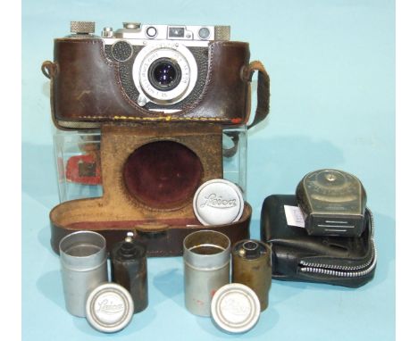 A Leica II Rangefinder camera no.241636, with Leitz Elmar f=5cm, 1:3.5 lens, in leather case, with two Leica film holders and