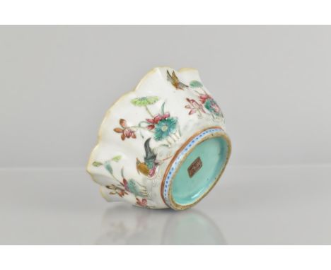 A Chinese Qing Dynasty Porcelain Lotus Bowl Decorated in the Famille Rose Palette with Pond Scene Detailing Birds, Flowers an