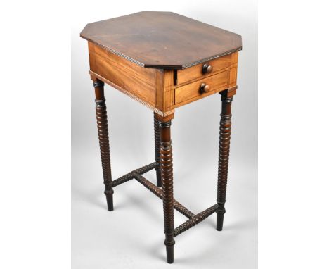 A 19th Century Mahogany Table with Canted Stringed Top to Two Short Drawers Supported on Bobbin Supports with H Frame Stretch