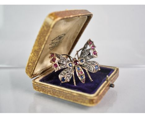 A 19th Century Gem Set Butterfly Brooch comprising Rose Cut Diamonds with Round and Mixed Cut Rubies and Sapphires, Central R