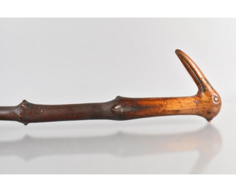 A 19th Century Folk Art Walking Stick, the Carved Head Handle in the Form of a Primitive Bird's Head, 91cm long