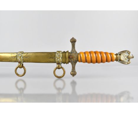 A WWII German Kriegsmarine Officers Dress Dagger by Adolf Braun, with Polished Brass Eagle Pommel Finial to Orange Cellulose 