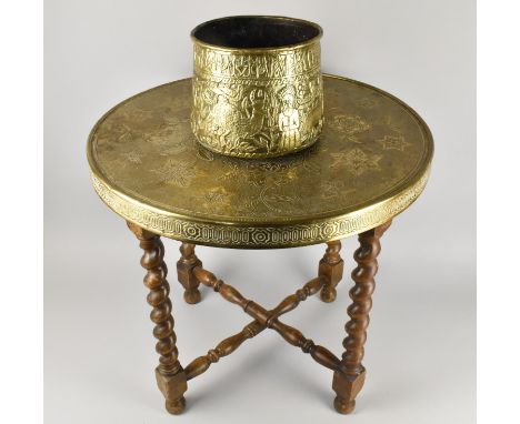 An Indian Benares Brass Tray on Folding Barley Twist Stand together with an Indian Brass Planter Decorated with Figures, Bird