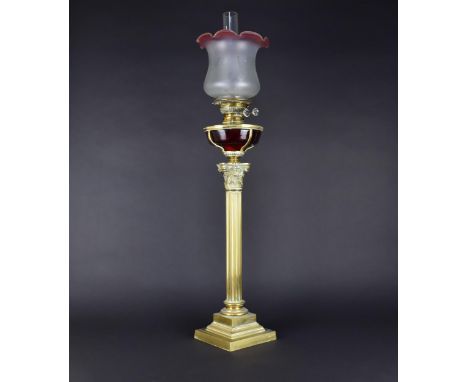 A Late 19th Century Wright &amp; Butler of Birmingham Brass Oil Lamp with Ruby Glass Reservoir on Corinthian Column Support R