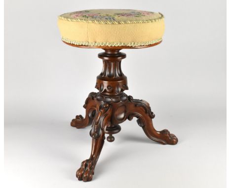 A 19th Century Tapestry Topped Piano Stool with Carved Support Having Claw Feet, 50cm high and 36cm Diameter (Mechanism Requi