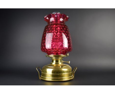 A Late 19th/Early 20th Century Brass Veritas Oil Lamp with Large Cranberry Glass Shade, Overall Height 48cm and Shade 30cm (C