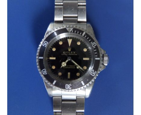 A 1966 stainless steel Rolex Submariner 5513 Oyster Perpetual bracelet wrist watch, serial no.1337***,  the gloss black dial 