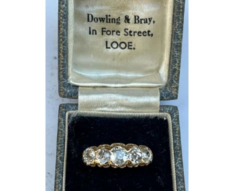 A late Victorian graduated five stone diamond ring, the total diamond weight approximately 3 carats, claw set in 18ct gold wi