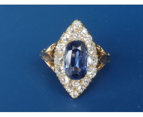 A Victorian colour change sapphire &amp; diamond marquise cluster ring on 18ct gold shank, the sapphire changing from blue to