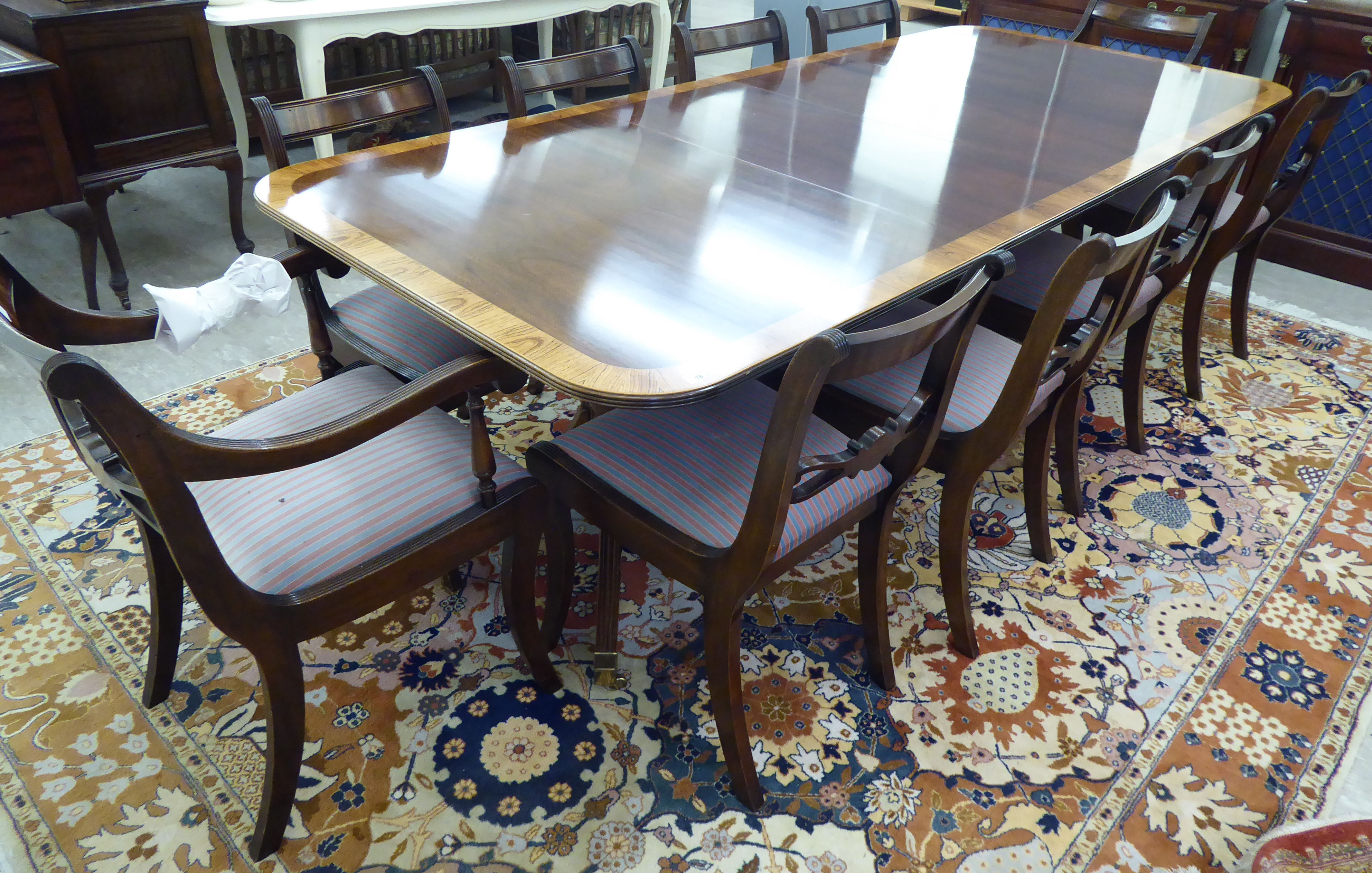 A Thomas Glenister of High Regency style mahogany finished twin