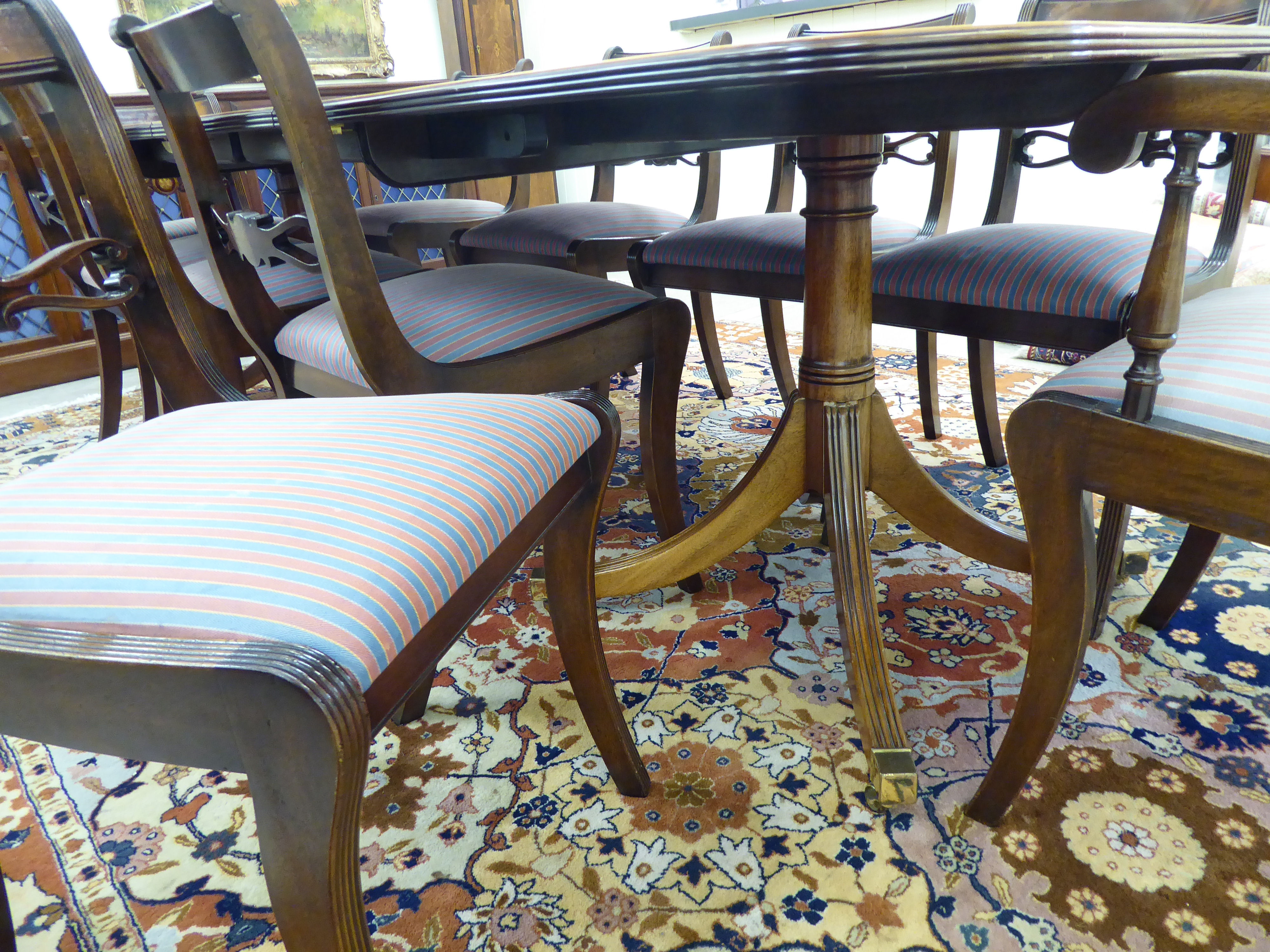 A Thomas Glenister of High Regency style mahogany finished twin