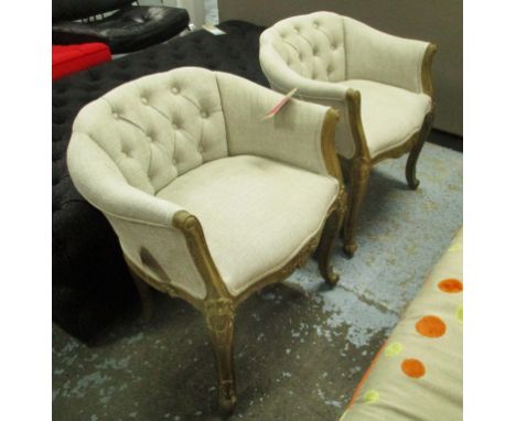 BEDROOM CHAIRS, a pair in neutral fabric button back on ornate frame, 61cm W. (2)