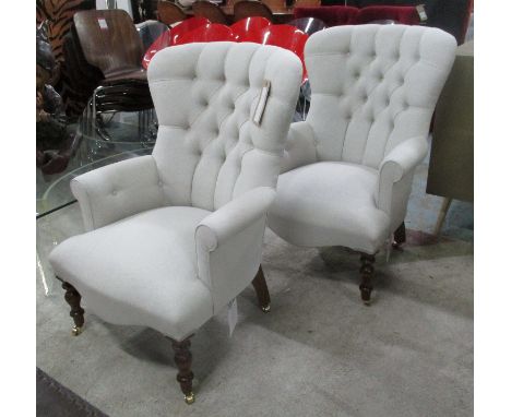 ARMCHAIRS, a pair, cream linen upholstery button back on turned supports, 67cm W. (2)