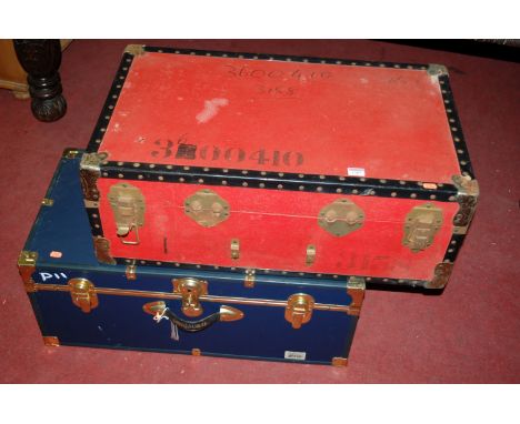 A canvas and metal bound travelling trunk, and one other similar (2)