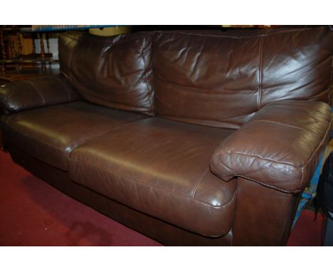 A contemporary chocolate brown leather upholstered three seater sofa