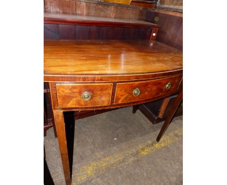 A REGENCY MAHOGANY AND ROSEWOOD BANDED BOW FRONT SIDE TABLE AND A SMALL INLAID BOOKCASE