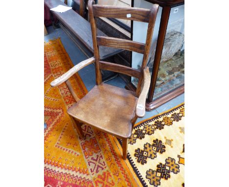 A GEORGIAN COUNTRY ASH AND ELM LADDER BACK ARMCHAIR