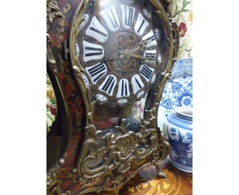 A 19TH.C.FRENCH TORTOISESHELL AND BRASS BOULLE BRACKET CLOCK, THE CASE OF SWEPT SIDED FORM ON CAST ROCCOCO FEET AND SURMOUNTE