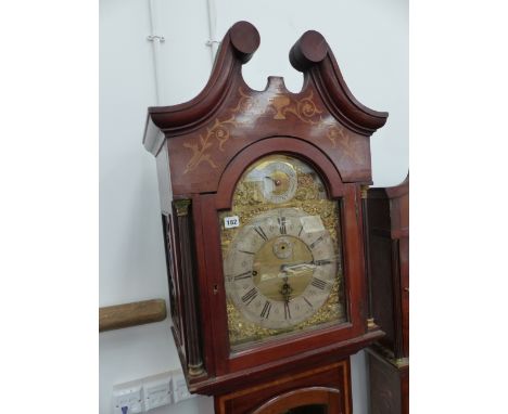 AN EARLY 20TH.C.MAHOGANY AND INLAID LONGCASE CLOCK WITH UNSIGNED ARCH BRASS DIAL AND SILVERED CHAPTER RING. THREE TRAIN MOVEM