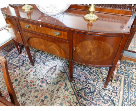 A LARGE ANTIQUE GEORGIAN STYLE MAHOGANY BOW FRONT SIDEBOARD.