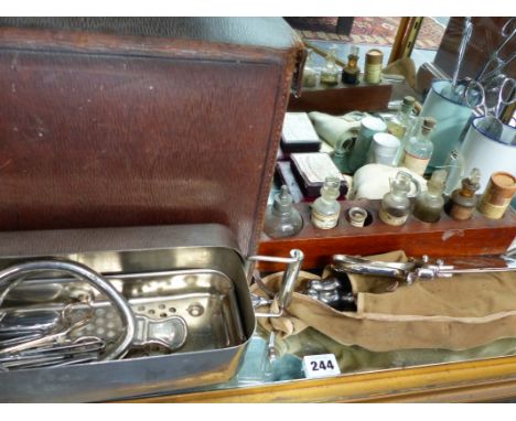A COLLECTION OF VINTAGE SURGICAL EQUIPMENT IN A LEATHER CASE.