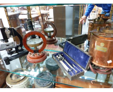TWO WWII PERIOD COMPASSES-MARINE AND AIR MINISTRY, A SCIENTIFIC STILL, A PLANIMETER, A MICROSCOPE. A MERCER GAUGE,ETC