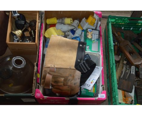 A box of various light bulbs and fittings