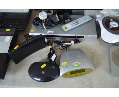 A quantity of electrical items to include a DVD player; radio alarm clock etc. 