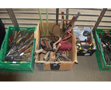 A box of various hand tools