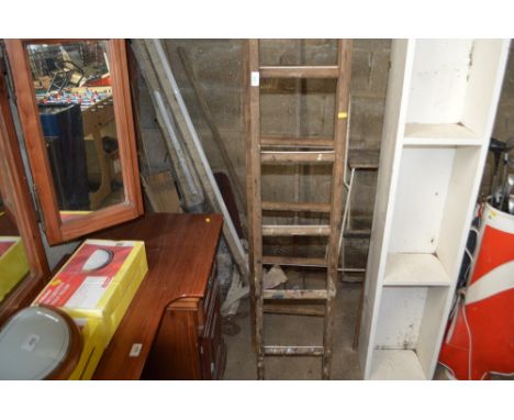 A wooden extending ladder 