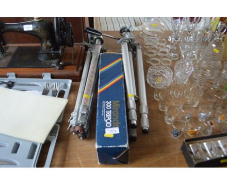 Three camera tripods