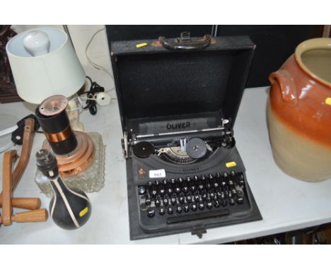 An Olivier typewriter in carrying case