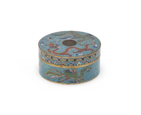 A Chinese cloisonné circular box and cover, Qing dynasty, 19th century, the cover with a dragon chasing a flaming pearl follo
